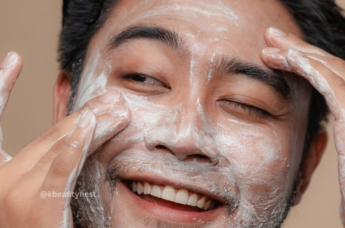 man washing his face with mid-range gel cleanser