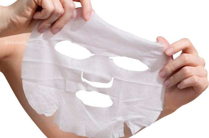 Female hands holding sheet mask
